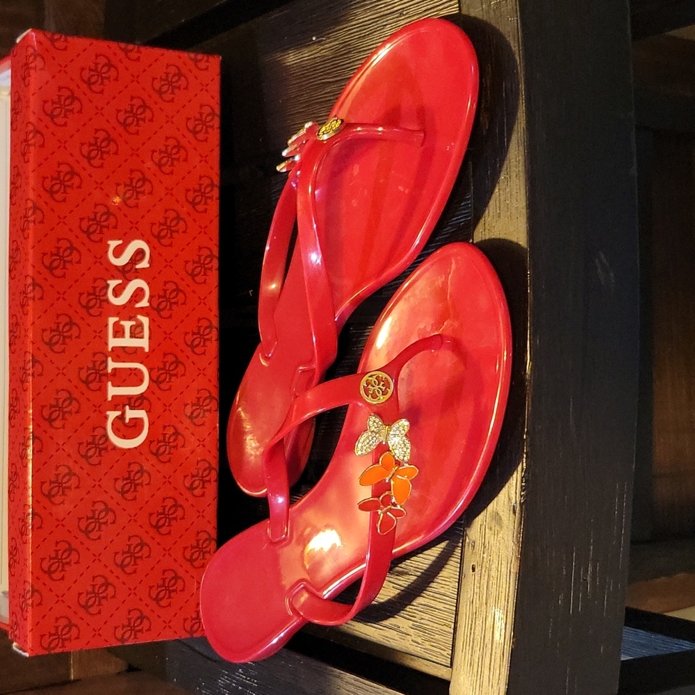 Guess Red Jelly Flip Flops with Butterfly Accents, size 8